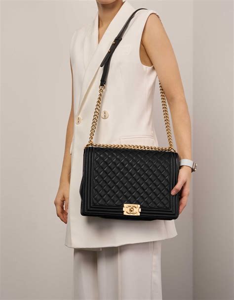 chanel boy bag gold black cream|boy chanel bag price.